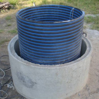 Inserting into a concrete septic tank: how to waterproof with a plastic insert