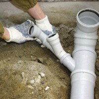 How to lay sewer pipes in a private house: schemes and rules for laying + installation steps