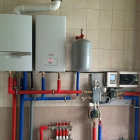 Gas and electric boiler in one system: features of the assembly of a parallel circuit