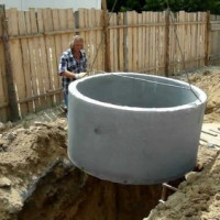 How to make a two-chamber septic tank from concrete rings: a building instruction