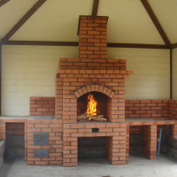 Brick stoves for giving on wood: the best orders and a step-by-step guide to the construction