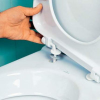 Securing the toilet lid: how to remove the old and install a new seat on the toilet