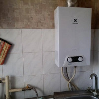 Presiune slabă a apei calde din coloana de gaz: motive pentru scăderea presiunii + instrucțiuni de curățare