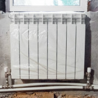 Connecting a heating radiator to a two-pipe system: choosing the best connection option