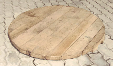 Wooden cover for a well