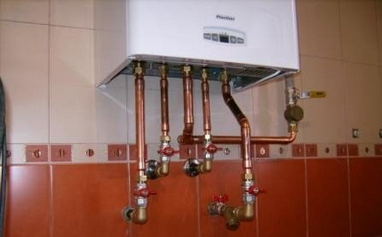 Installation of a wall gas boiler