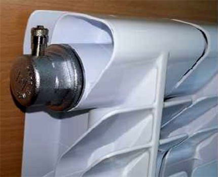 Heating radiator with Mayevsky tap