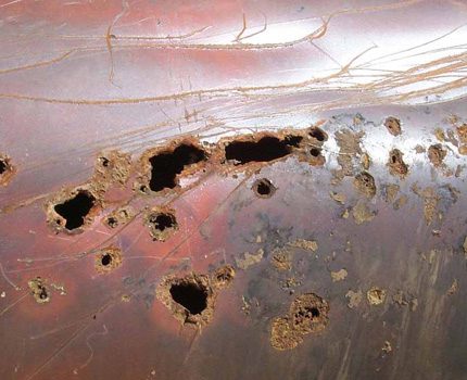 Corrosion of a metal septic tank