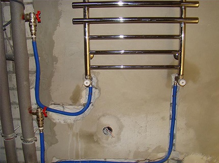 Concealed piping to the heated towel rail