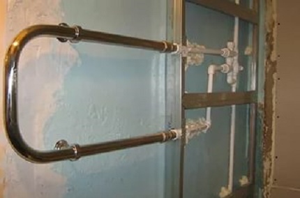 How to connect a heated towel rail to the heating system