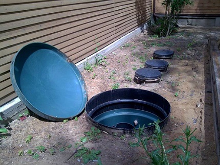 Details of a septic tank made of plastic barrels