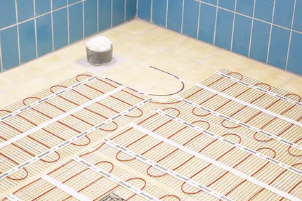 The combination of an electric cable with a tile