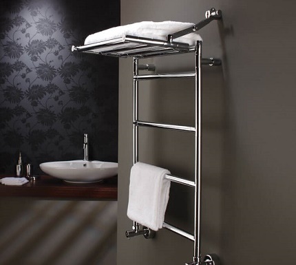 Chrome heated towel rail with shelf