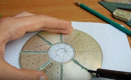 Cutting a disc with a soldering iron