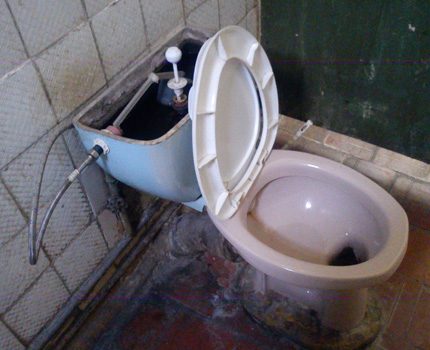 A grinder may come in handy to dismantle an old toilet