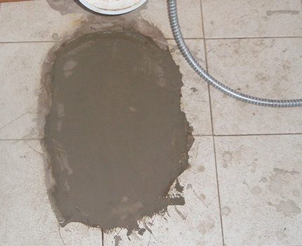The floor in place of the old toilet
