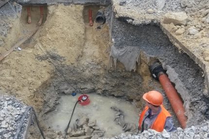 Pumping water from the pit and trenches