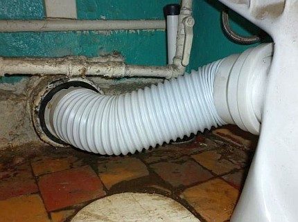 Corrugated pipe with a toilet