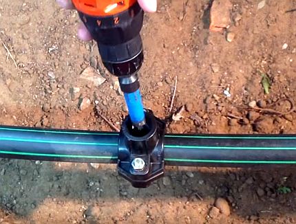 Drilling a hole in a pipe