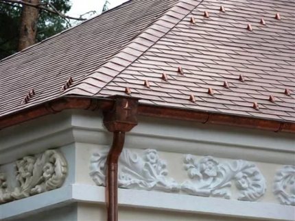 Roof and gutter made of copper