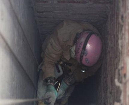 Cleaning the ventilation shaft of an apartment building
