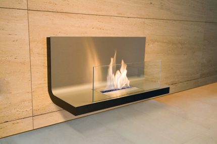 Open fireplace with a protective screen