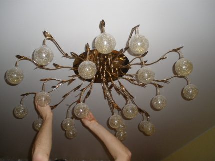 The absence of light in the chandelier