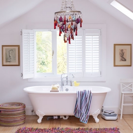 Colored crystal chandelier above the bathtub