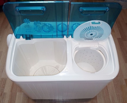 Activator washing machine with centrifuge