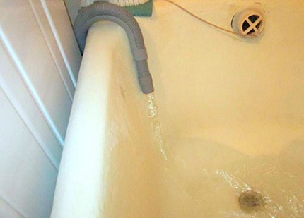 Discharge the drain hose into the bath