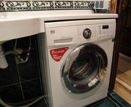 Narrow washing machine in the interior