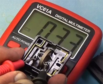 The use of a multimeter when checking the posistor
