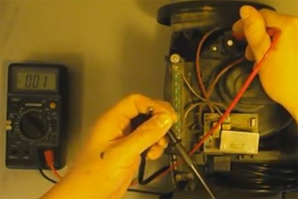 Checking the vacuum cleaner button with a tester