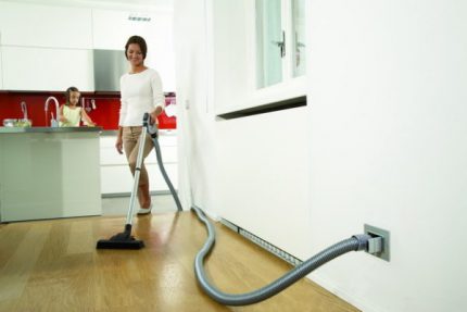 Built-in vacuum cleaner with a long hose