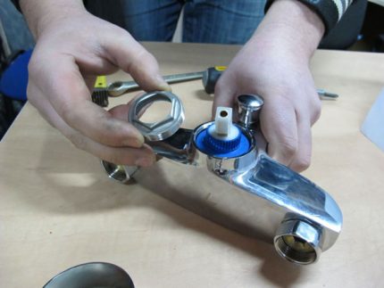 Single lever mixer disassembly