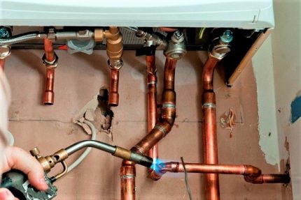 Soldering copper boiler pipes
