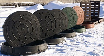Sewer manholes in the snow