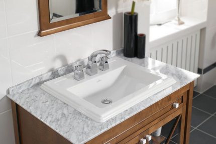 Built-in small sink on a waterproof countertop