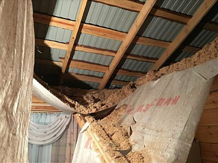 The collapsed insulated ceiling in the house