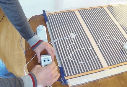 Assemblage et installation d'un système de chauffage infrarouge