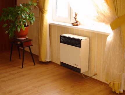 Gas convector under the window