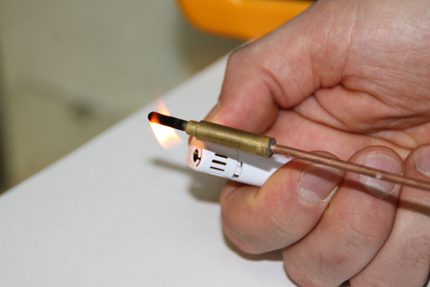 Checking the performance of the thermocouple with a lighter