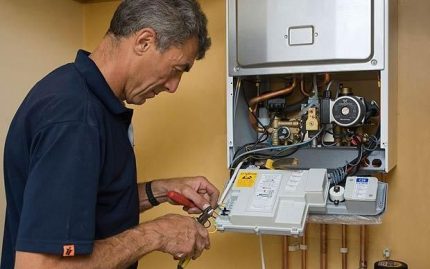 Repair of a gas boiler by a gasman
