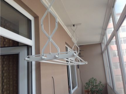 Clothes dryer with sliding mechanism